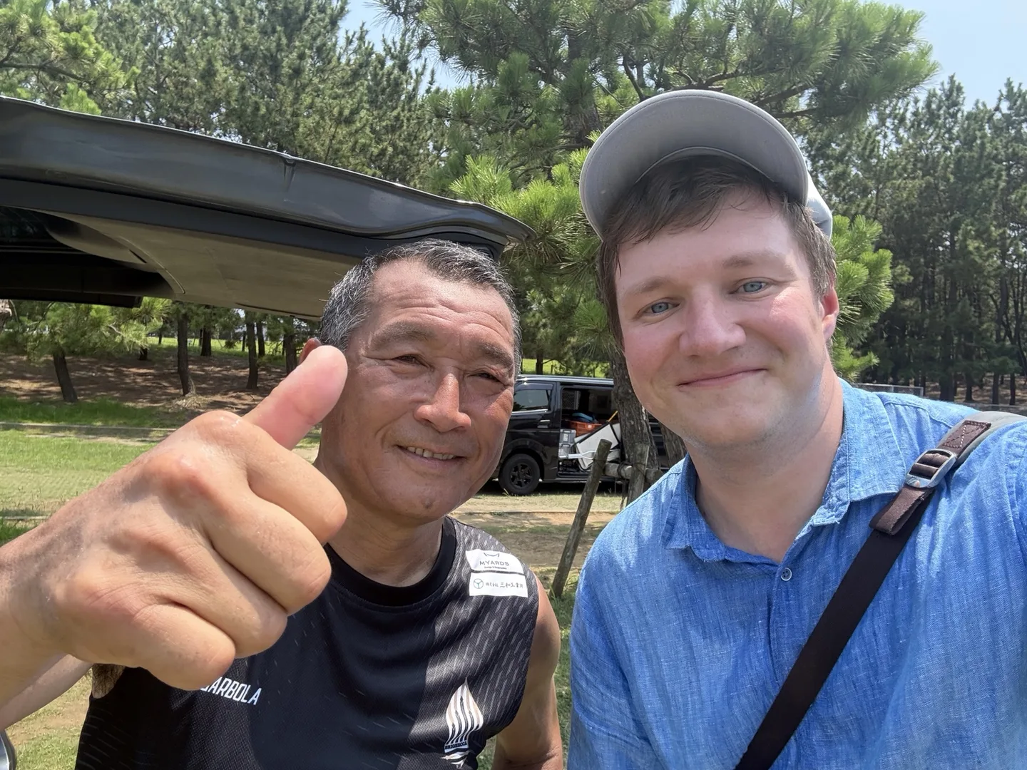 Dmitry Gavrilov with Briobecca Urayasu head coach Satoshi Tsunami